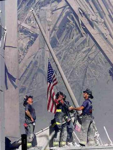 Photo Credit: http://files.myopera.com/biggy/blog/WTC_Flag.jpg
